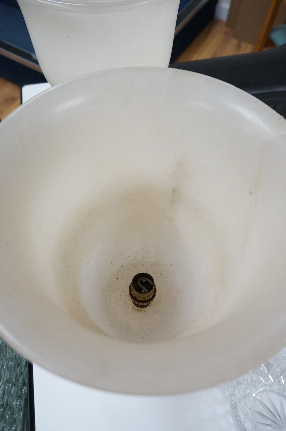 A pair of French Art Deco alabaster carved table lamps in a Chinese style, 42cm high. Condition - fair/good, untested